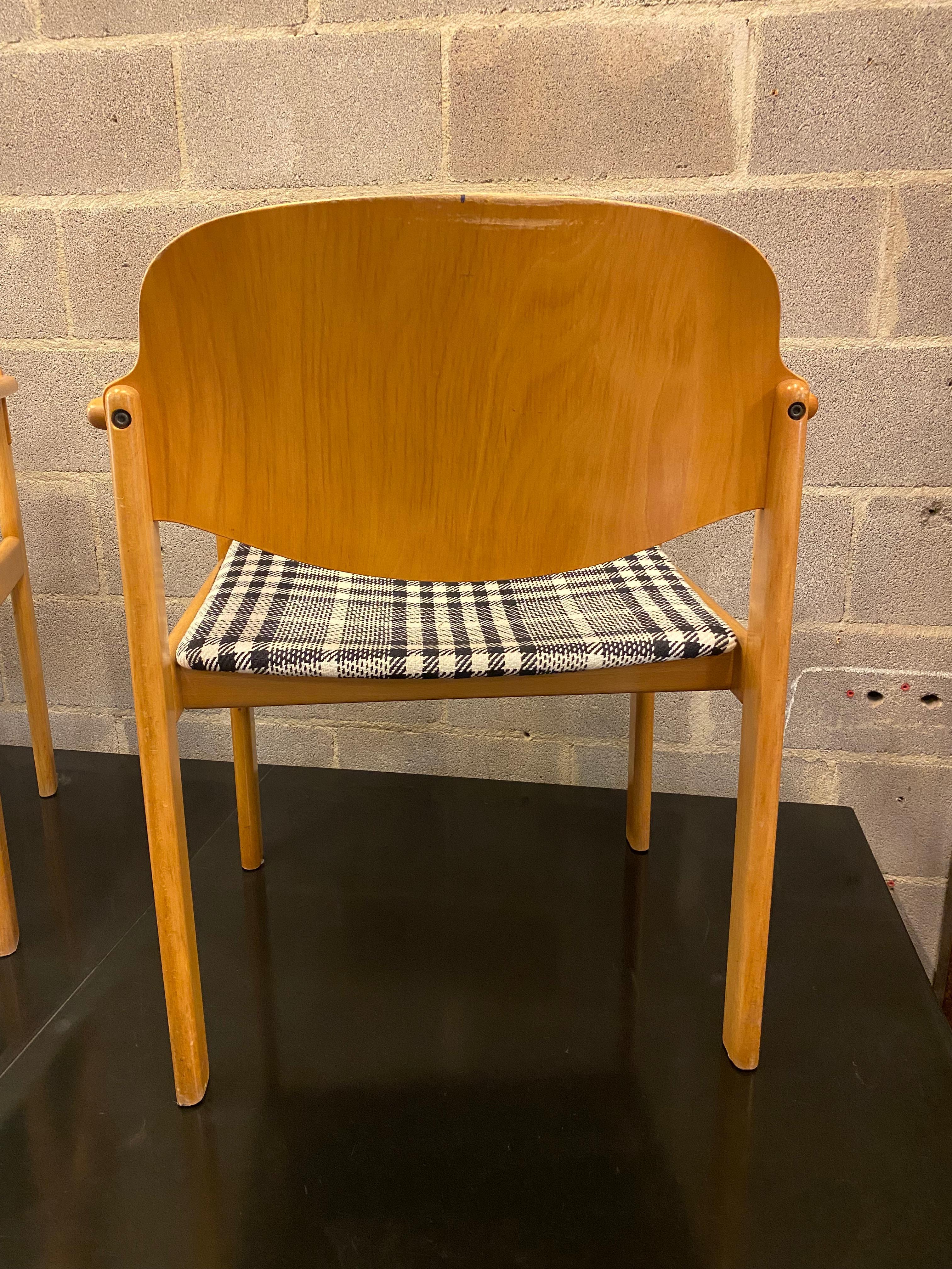 Pair of Mid-Century Modern armed dining chairs or office chairs. Scandinavian styling in solid birch frame with bentwood back and custom upholstered seat in black and white plaid. Very comfortable and sturdy, Netherlands, 1970s. Sold in pairs, three