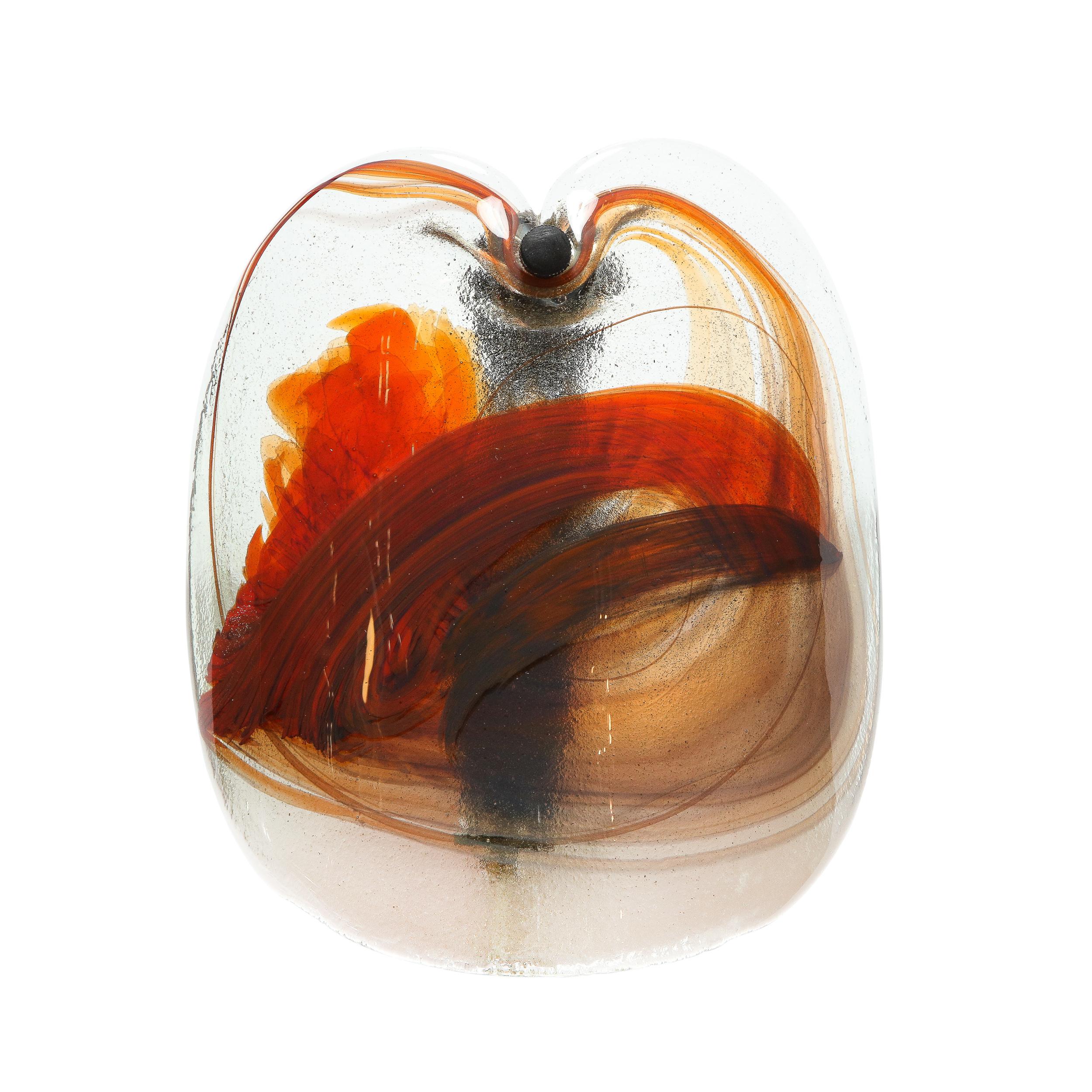 This stunning pair of Mid-Century Modern sconces were realized in Sweden, circa 1970. They feature translucent concave glass bodies with sinuously curved silhouettes and expressionistic ruby red detailing embedded in the hand blown glass and oil