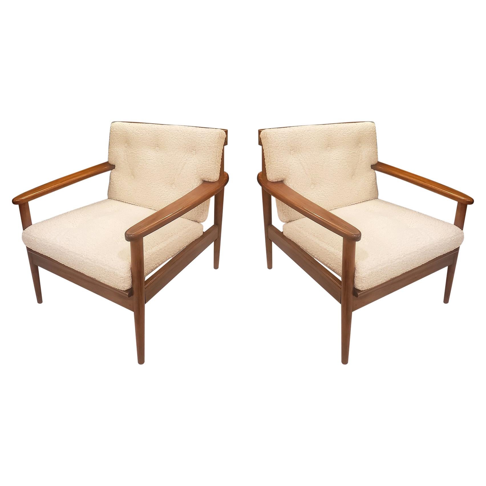 Pair of Scandinavian Mid-Century Lounge Chairs Upholstered in Boucle Fabric For Sale