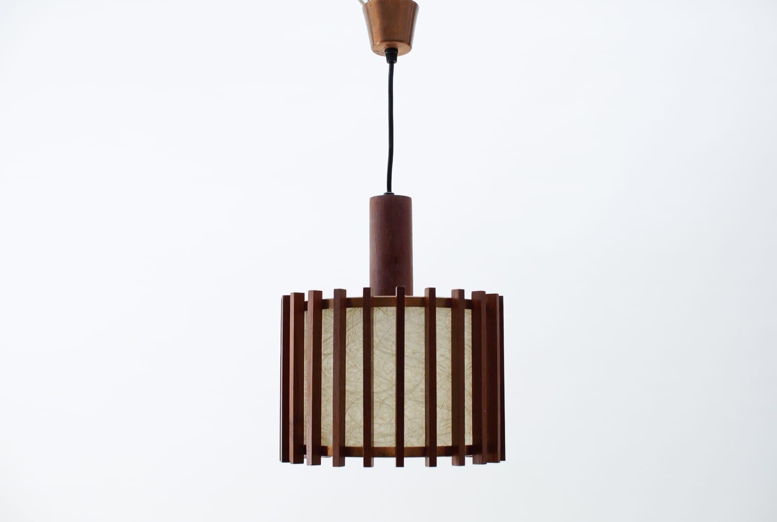 Executed in teak wood, copper and metal, each lamp needs 1 x E27 / E26 Edison screw fit bulb, is wired, in working condition and runs both on 110 / 230 volt.

Our lamps are checked, cleaned and are suitable for use in the USA.