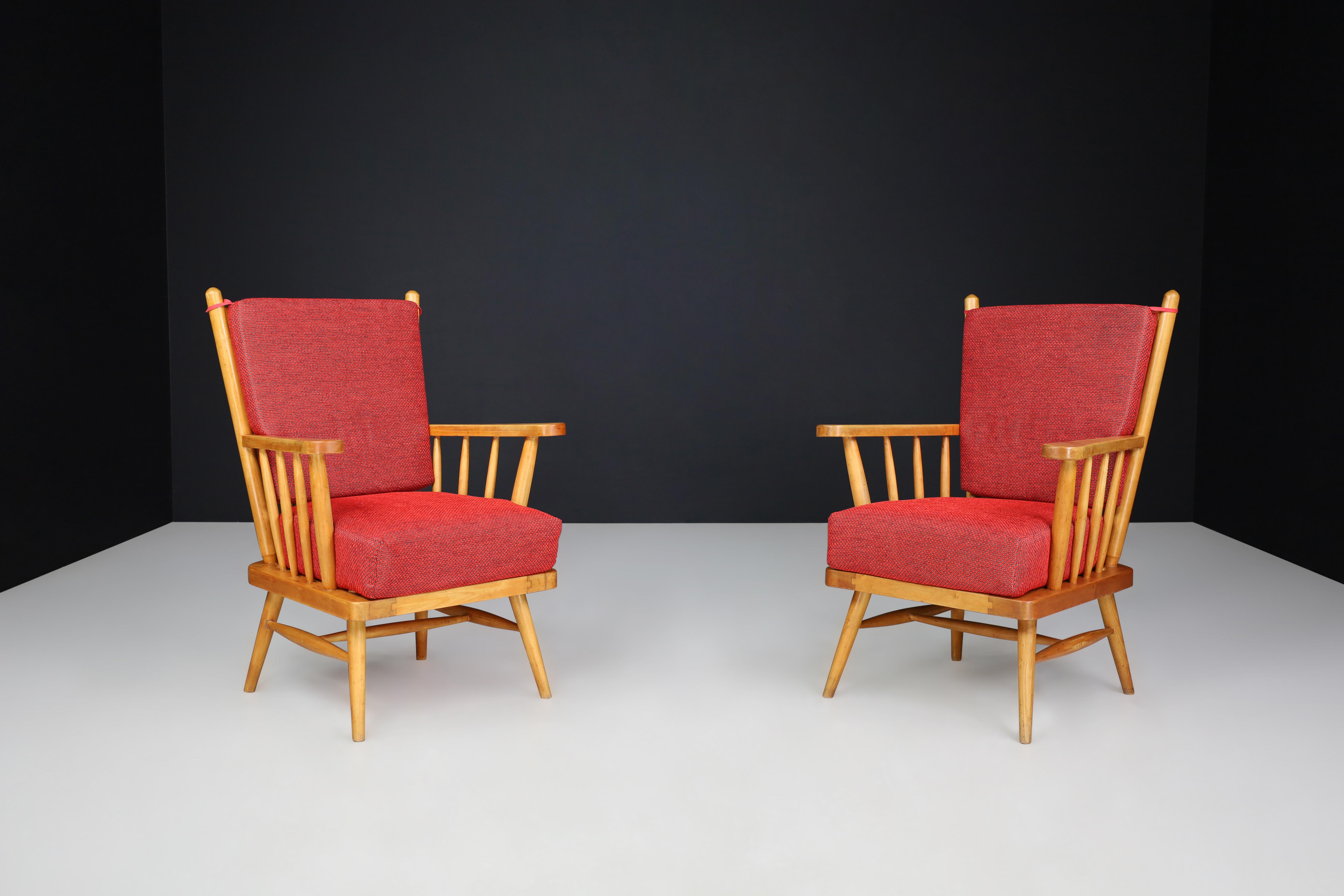 Pair of Scandinavian Mid-Century Modern Lounge Chairs in Beech and Red Upholstery, 1950s

A standout pair of Scandinavian mid-century lounge chairs from the 1950s, expertly crafted in solid beech and recently reupholstered in a bold red woven