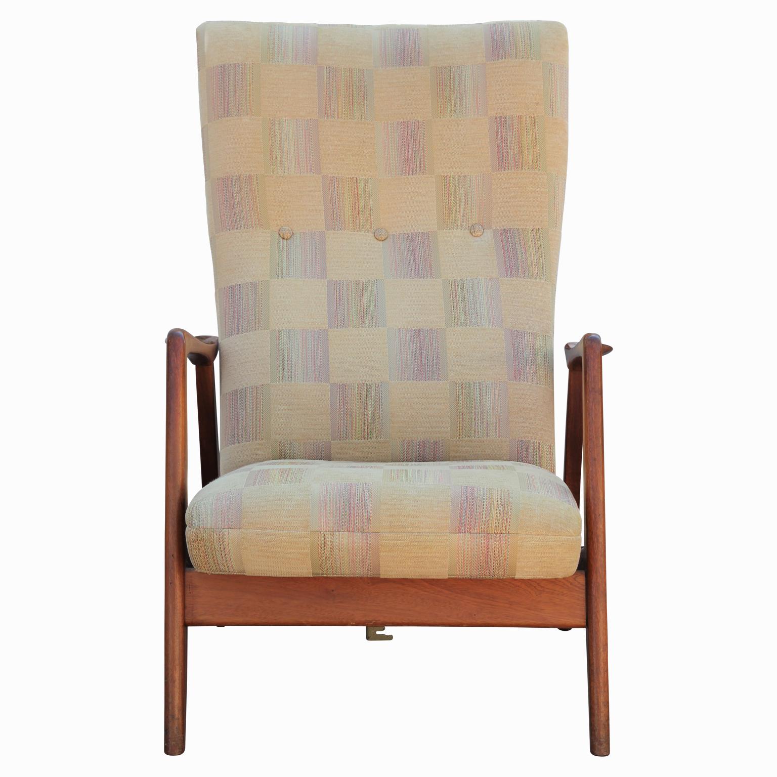 Pair of cream checkered and wood reclining lounge chairs designed by Arnestad Bruk. The 'Rock Siesta Chair' is a beautiful example of functional Mid-Century Modern furniture. The chair is stamped on the wood base by the manufacturer 