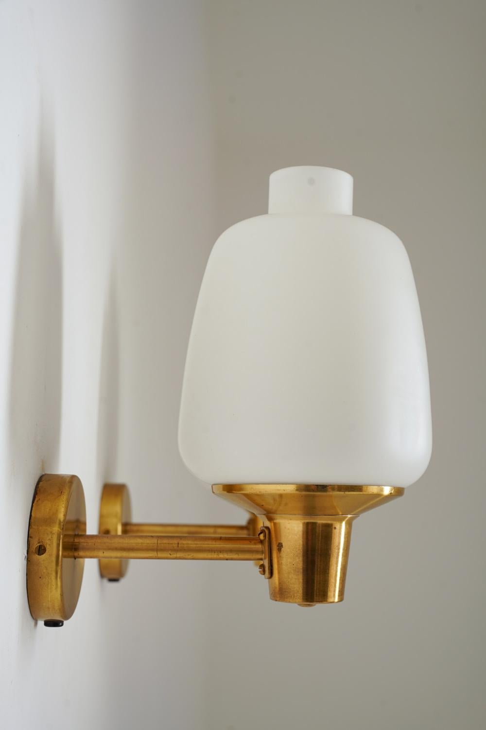 Norwegian Pair of Scandinavian Midcentury Wall Lamps in Brass and Glass