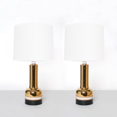 Pair of Scandinavian Modern gold ceramic lamps from Bergboms.