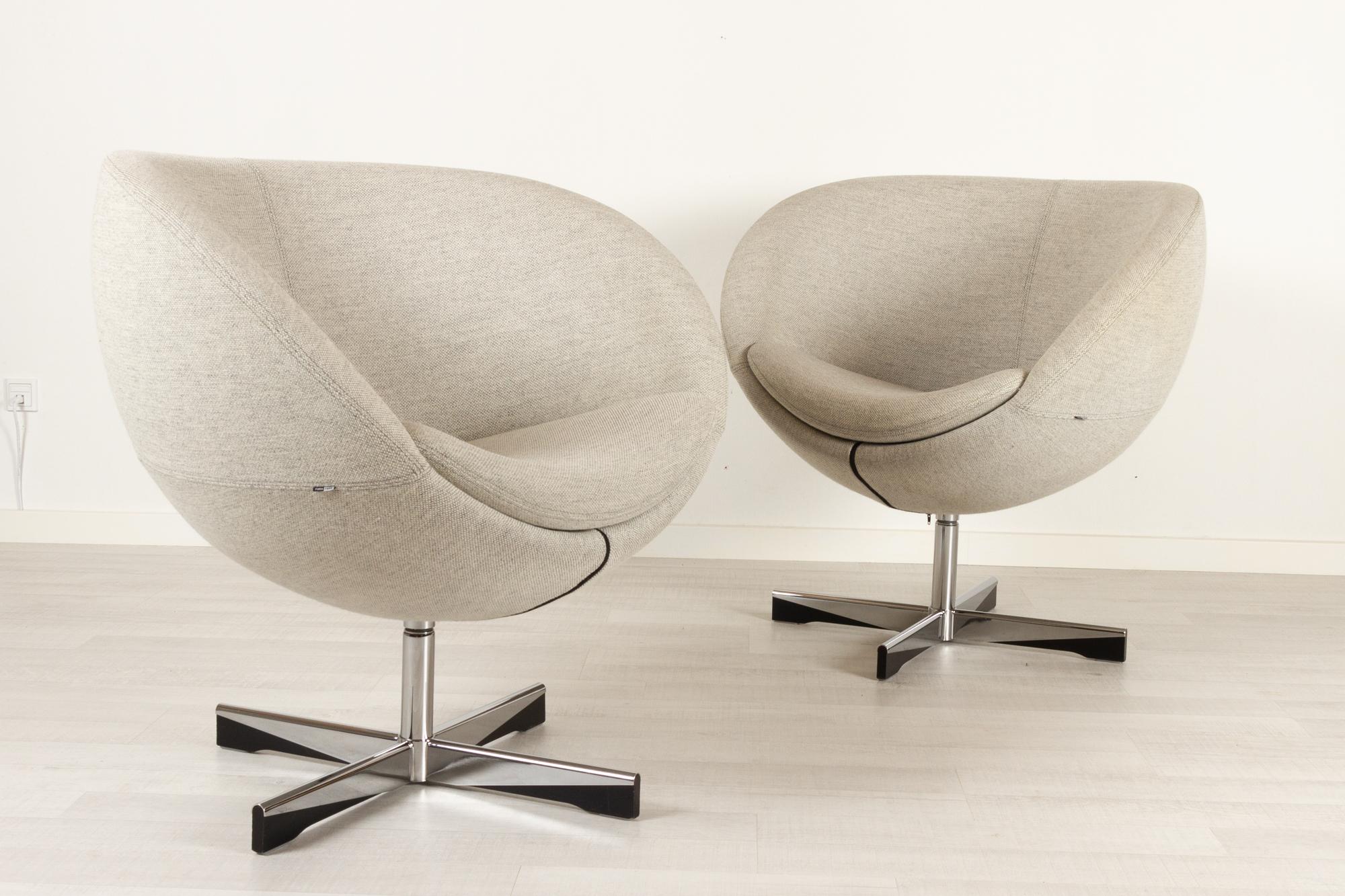Pair of Scandinavian Modern lounge chairs by Sven Ivar Dysthe 21st century
The model Planet chair was designed by Sven Ivar Dysthe in 1965. The chair is an established Norwegian furniture Classic. The encompassing round shape provides a very