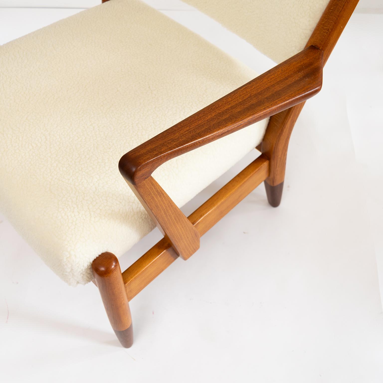 Pair of Scandinavian Modern Lounge Chairs with Faux Sheepskin, Teak Details 3