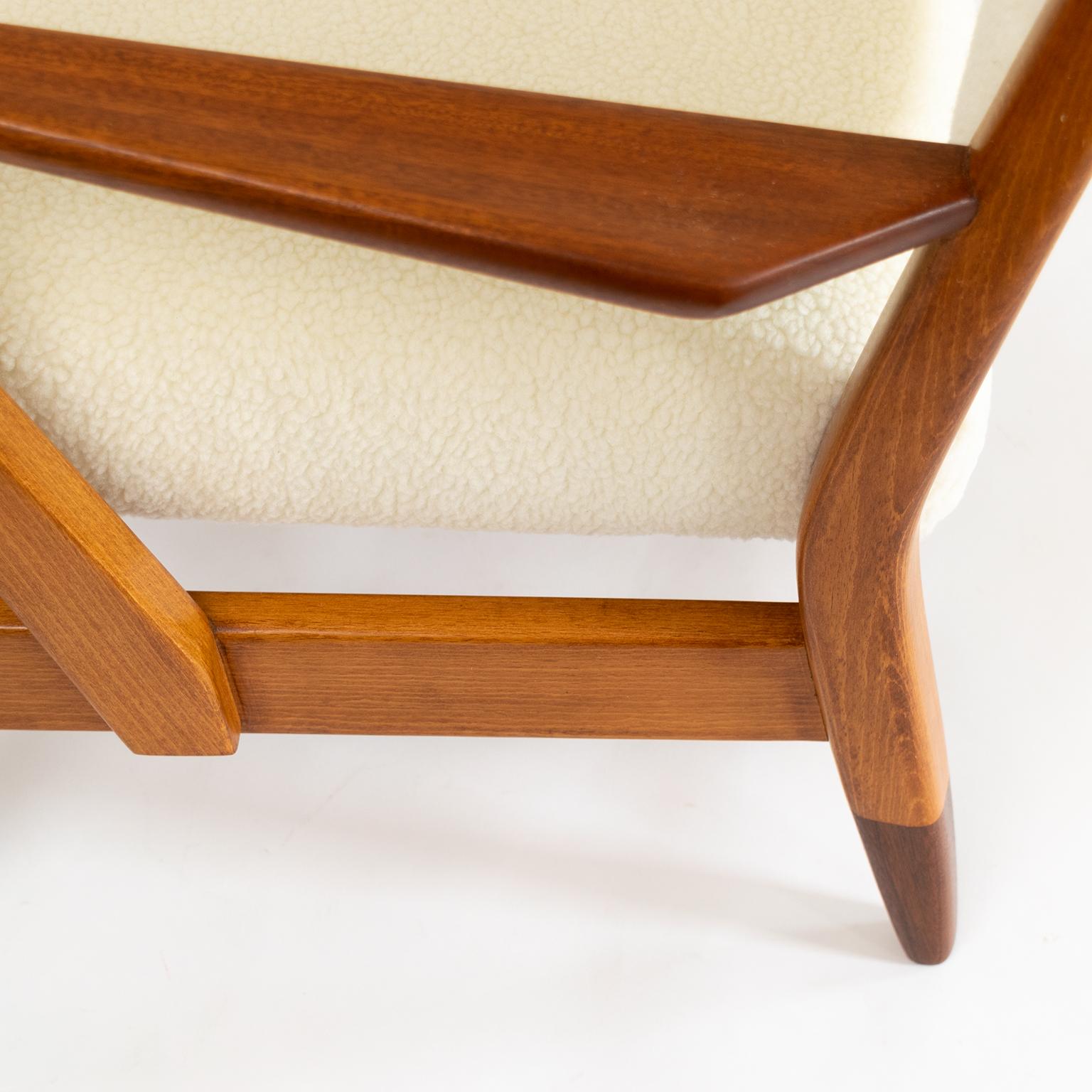 Pair of Scandinavian Modern Lounge Chairs with Faux Sheepskin, Teak Details 4