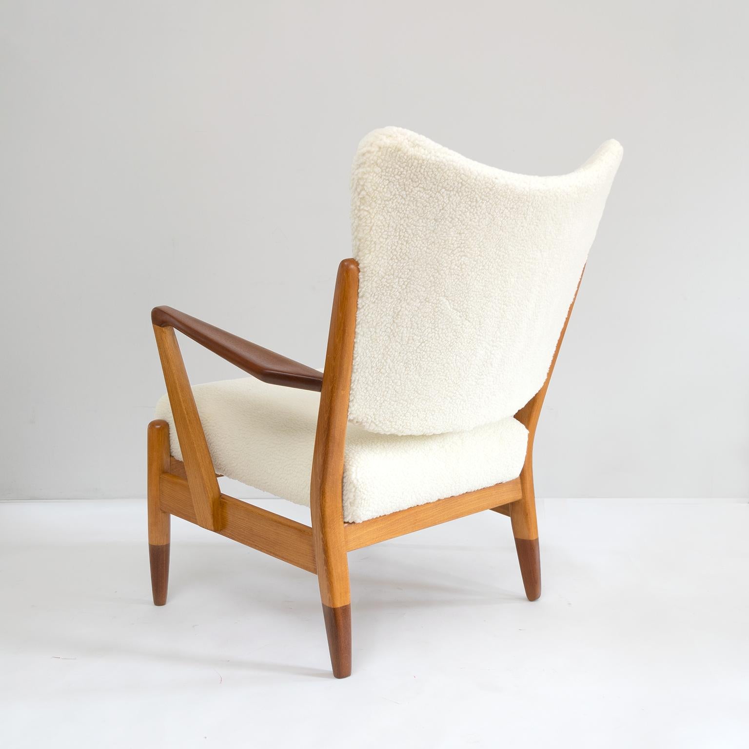 Wood Pair of Scandinavian Modern Lounge Chairs with Faux Sheepskin, Teak Details