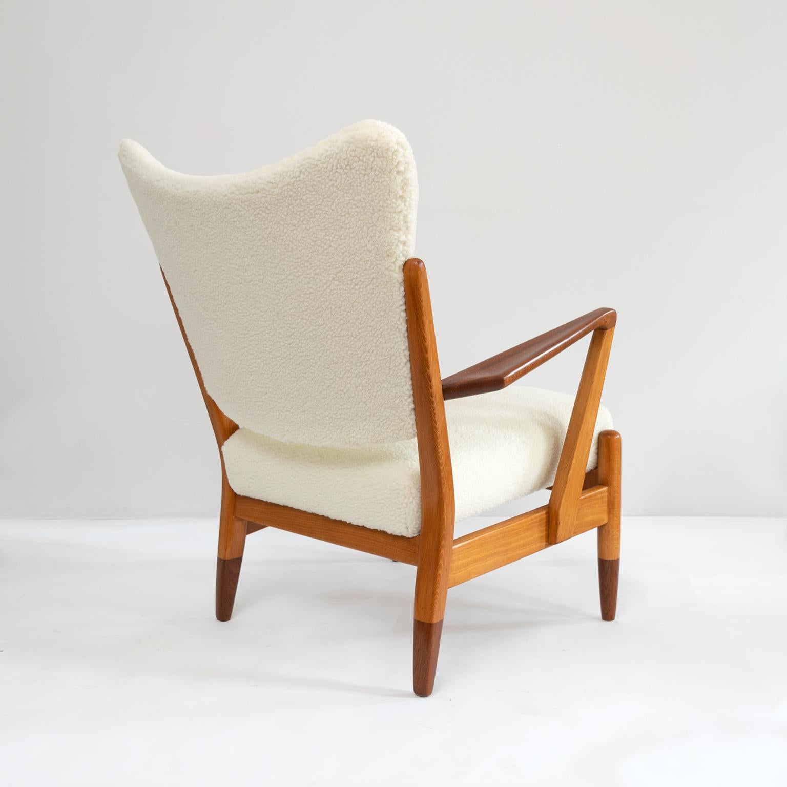 Pair of Scandinavian Modern Lounge Chairs with Faux Sheepskin, Teak Details 1