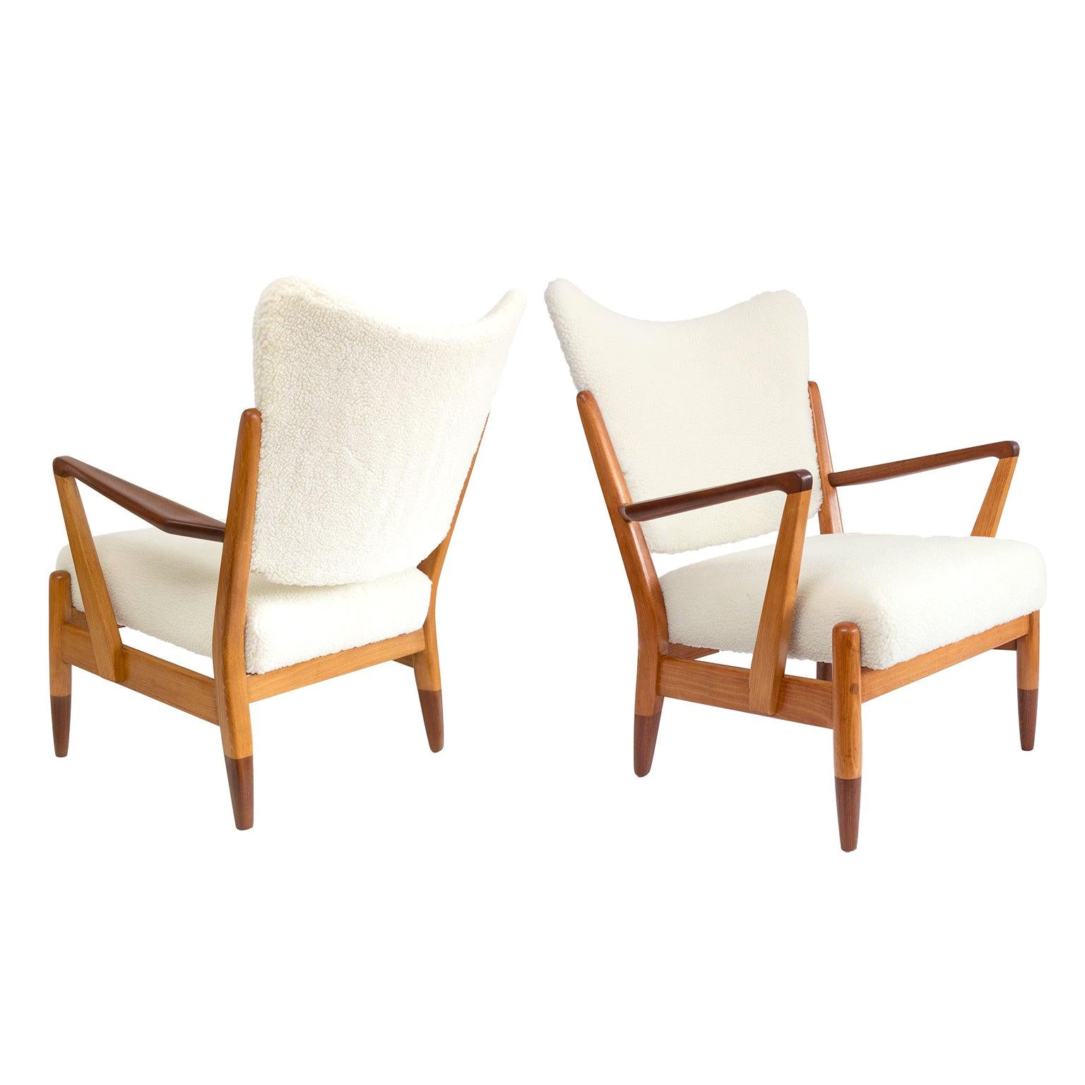 Pair of Scandinavian Modern Lounge Chairs with Faux Sheepskin, Teak Details