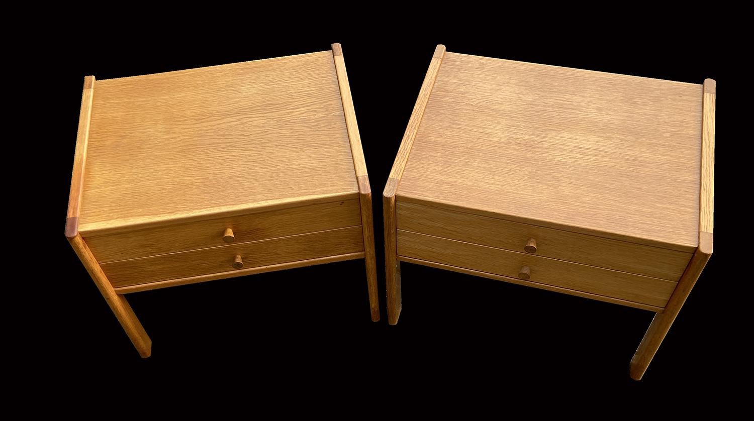 A nice pair of oak bedside tables. Unfortunately we do not know the designer or makers, but good value for money!