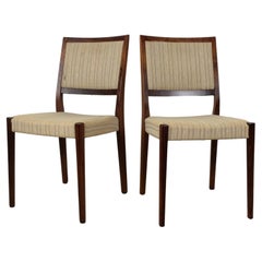 Coppia di sedie moderne scandinave in legno di palissandro con tappezzeria vintage