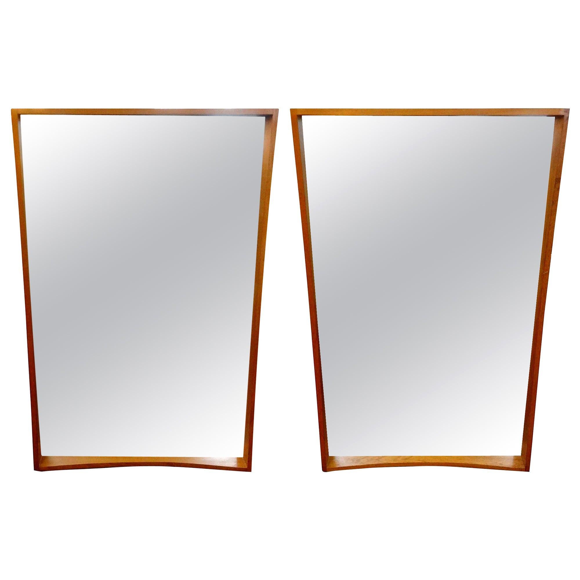 Stunning matching pair of Scandinavian Modern teak mirrors by Pedersen & Hansen, Denmark. These great Mid-Century Modern Pedersen & Hansen mirrors have a three dimensional effect and show beautiful dovetailing at each corner. Both mirrors in great