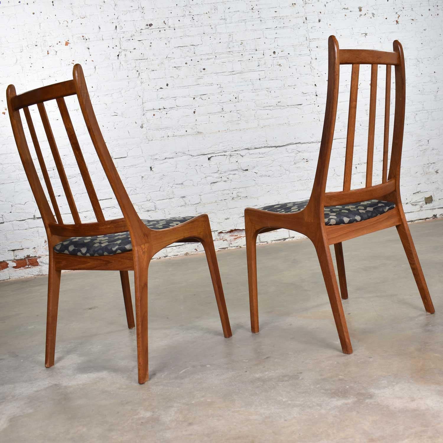 Handsome pair of teak Scandinavian Modern side chairs by Nordic Furniture Company of Markdale, Ontario, Canada. They are in fabulous vintage condition with new geometric upholstery fabric. Please see photos, circa 1970s.

Danish