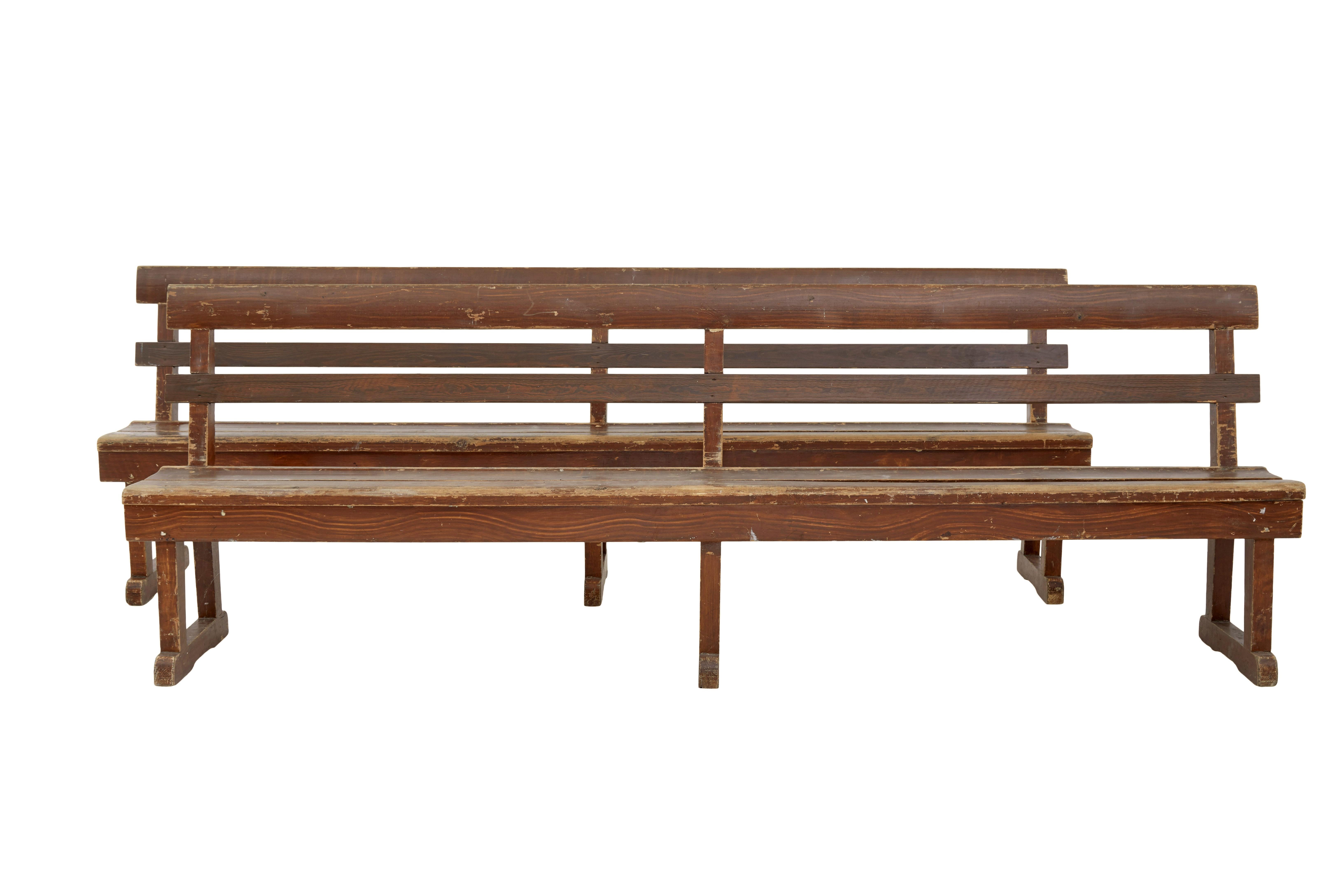 Pair of Scandinavian painted pine benches circa 1890.

Good quality rustic pair of Swedish painted benches made in pine.  These almost certainly would have been on rail station or somewhere similar.

2 plank backs with a 2 plank seat, each supported