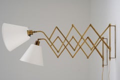 Pair of Scandinavian Scissor lamps in brass by ASTRA