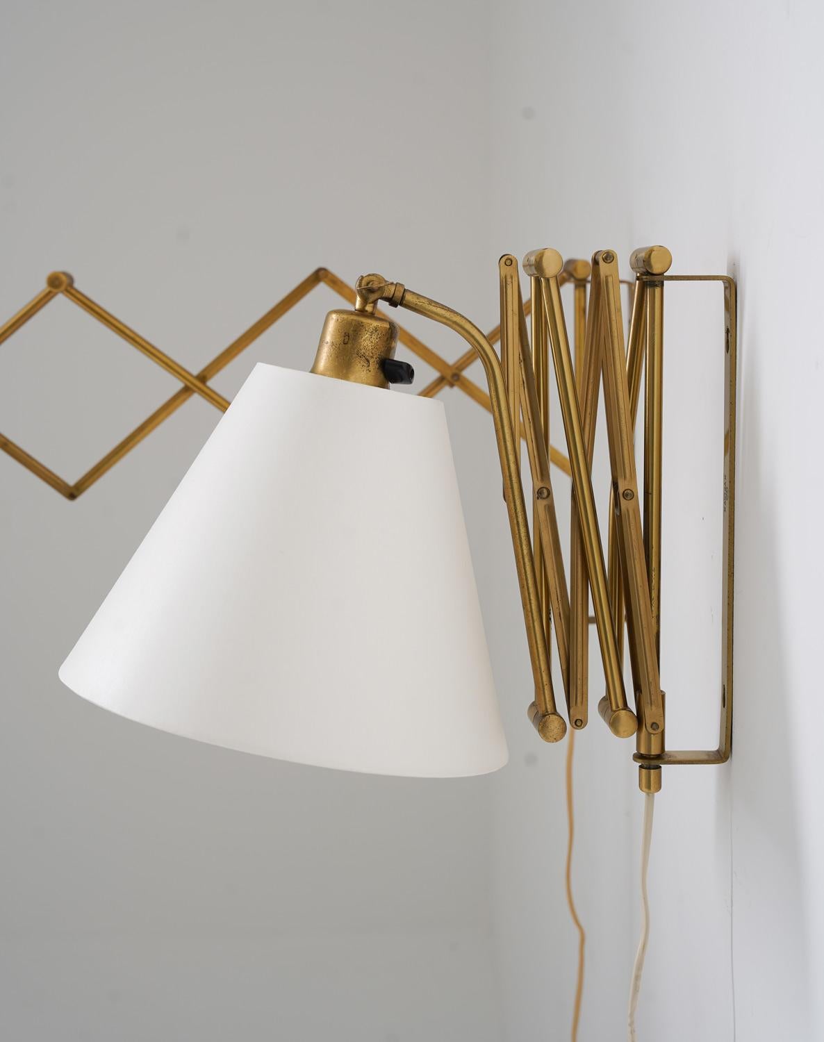 Norwegian Pair of Scandinavian Scissor lamps in brass by ASTRA