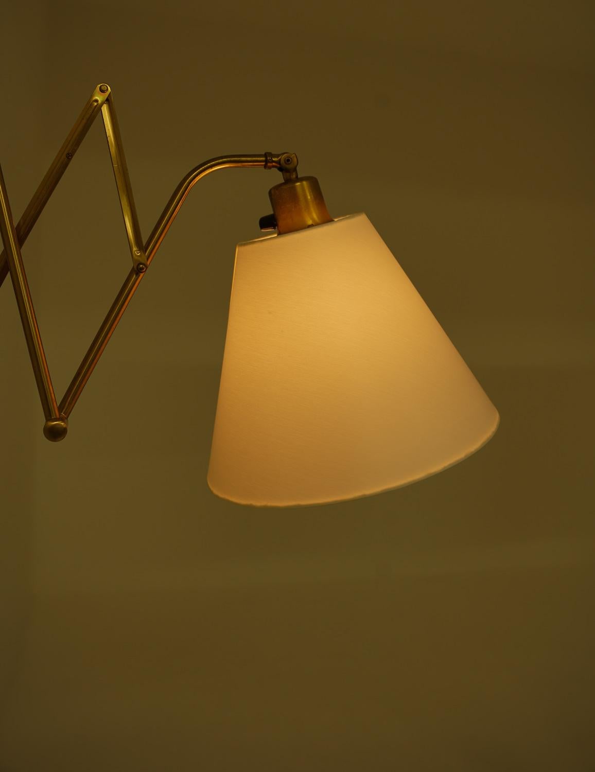 Pair of Scandinavian Scissor lamps in brass by ASTRA 1