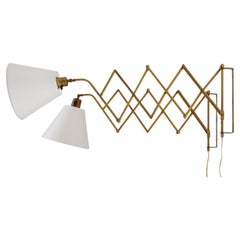 Pair of Scandinavian Scissor lamps in brass by ASTRA
