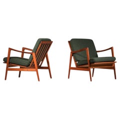 Pair of Scandinavian-style solid wood Italian armchairs from the 60s