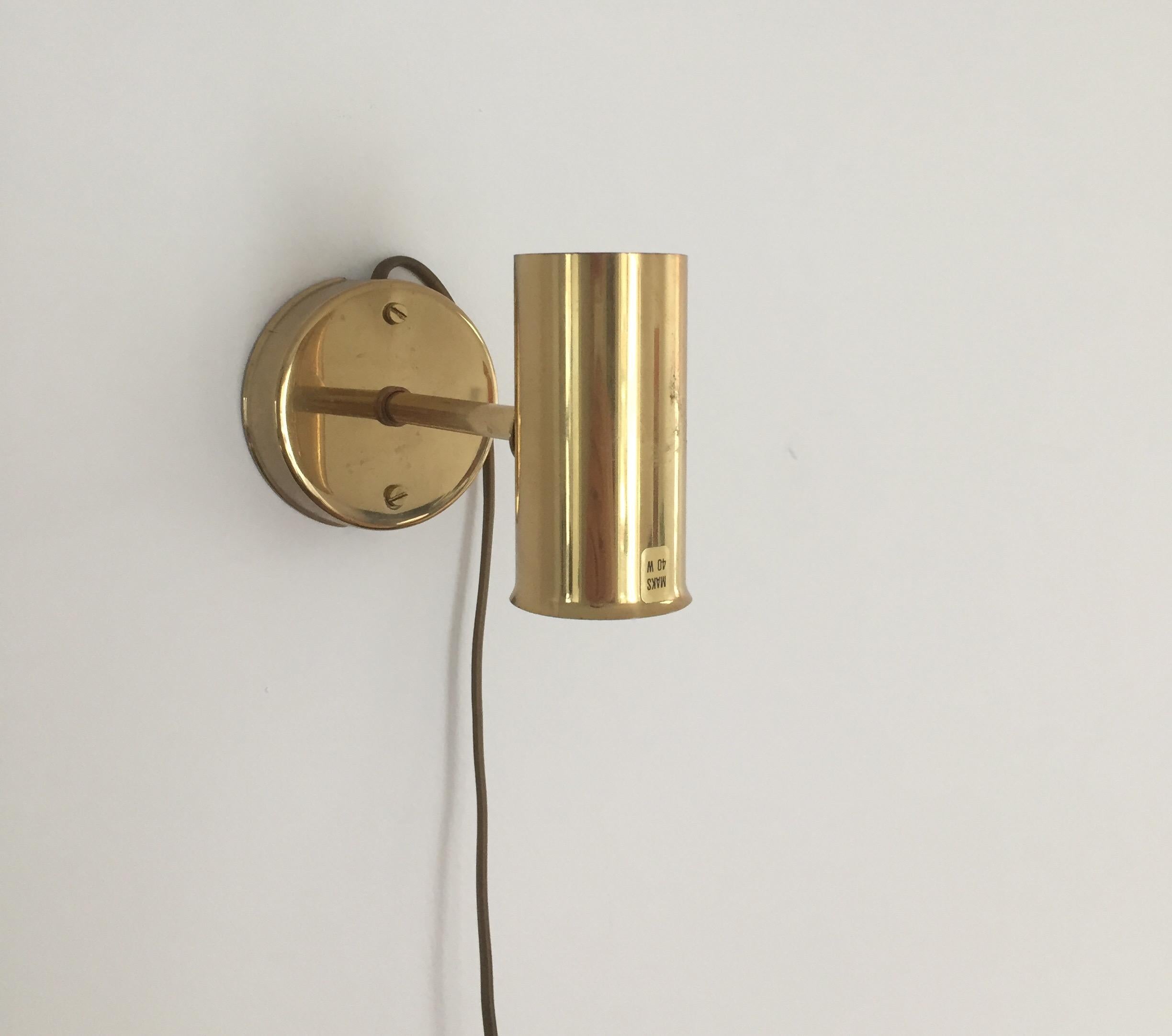 Brass wall lamps in the style of Scandinavian modern.
Designed and possibly produced in Norway in the 1950s-1960s.