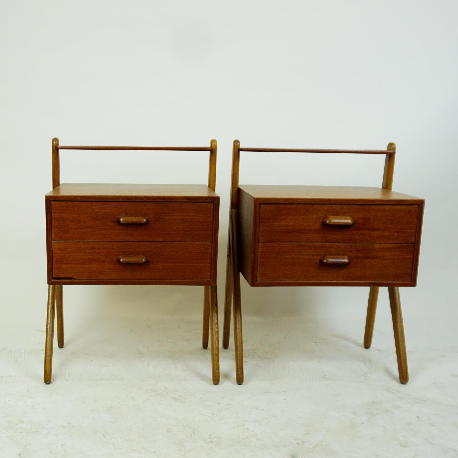 Charming small piece of furniture from the 1960s, featuring two drawers each and a storage shelf. They can be used as a nightstand or as well in the wardrobe. Authentic example for Danish modern design from this period. Both are in overall very good