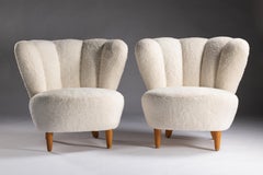Pareja de butacas escandinavas vintage blancas años 50, tapicería de piel de oveja