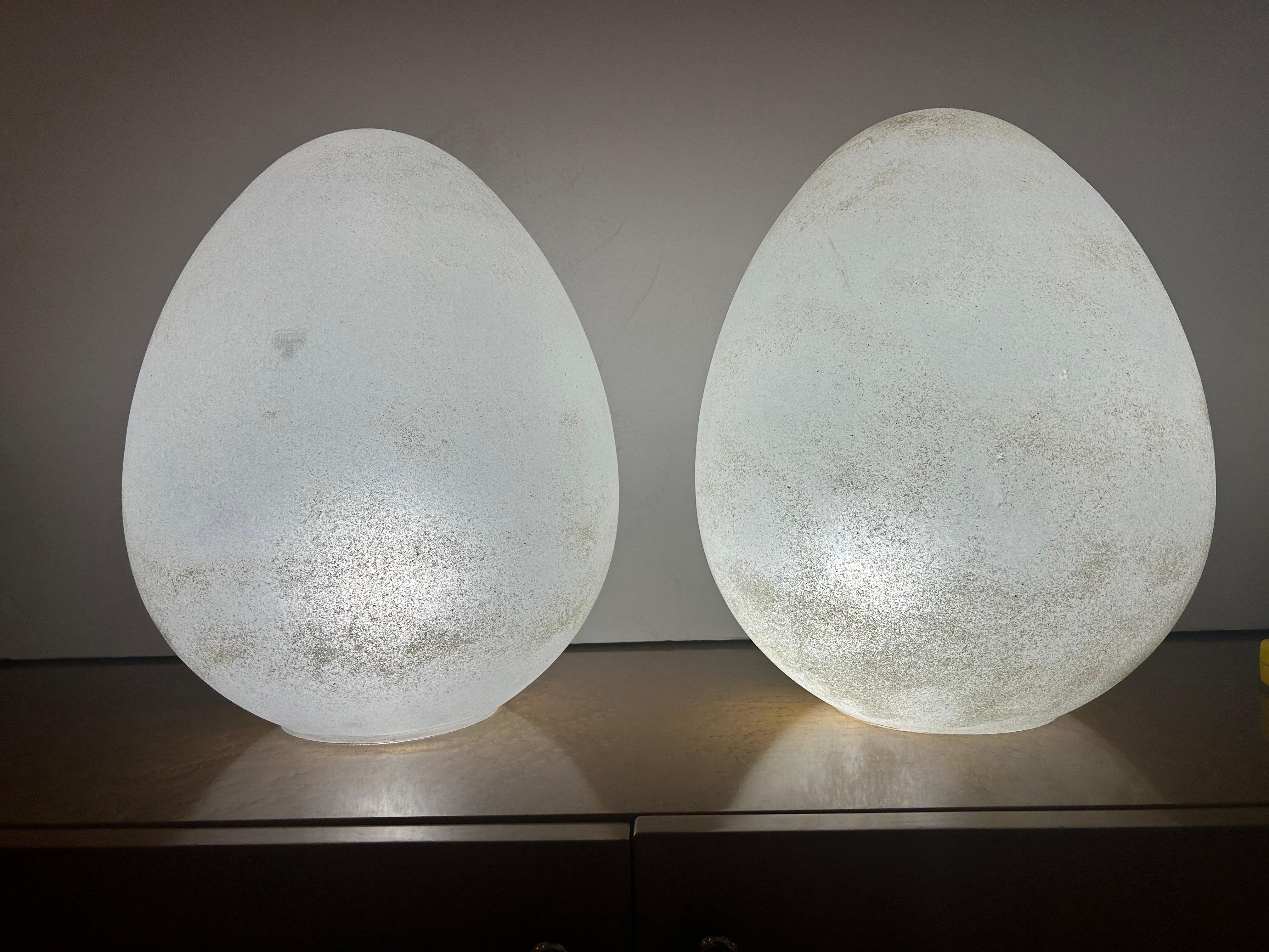 Pair of internally illuminated glass lamps, egg forms with rough Scavo finish attributed to Cendese , Murano Italy, 1970s