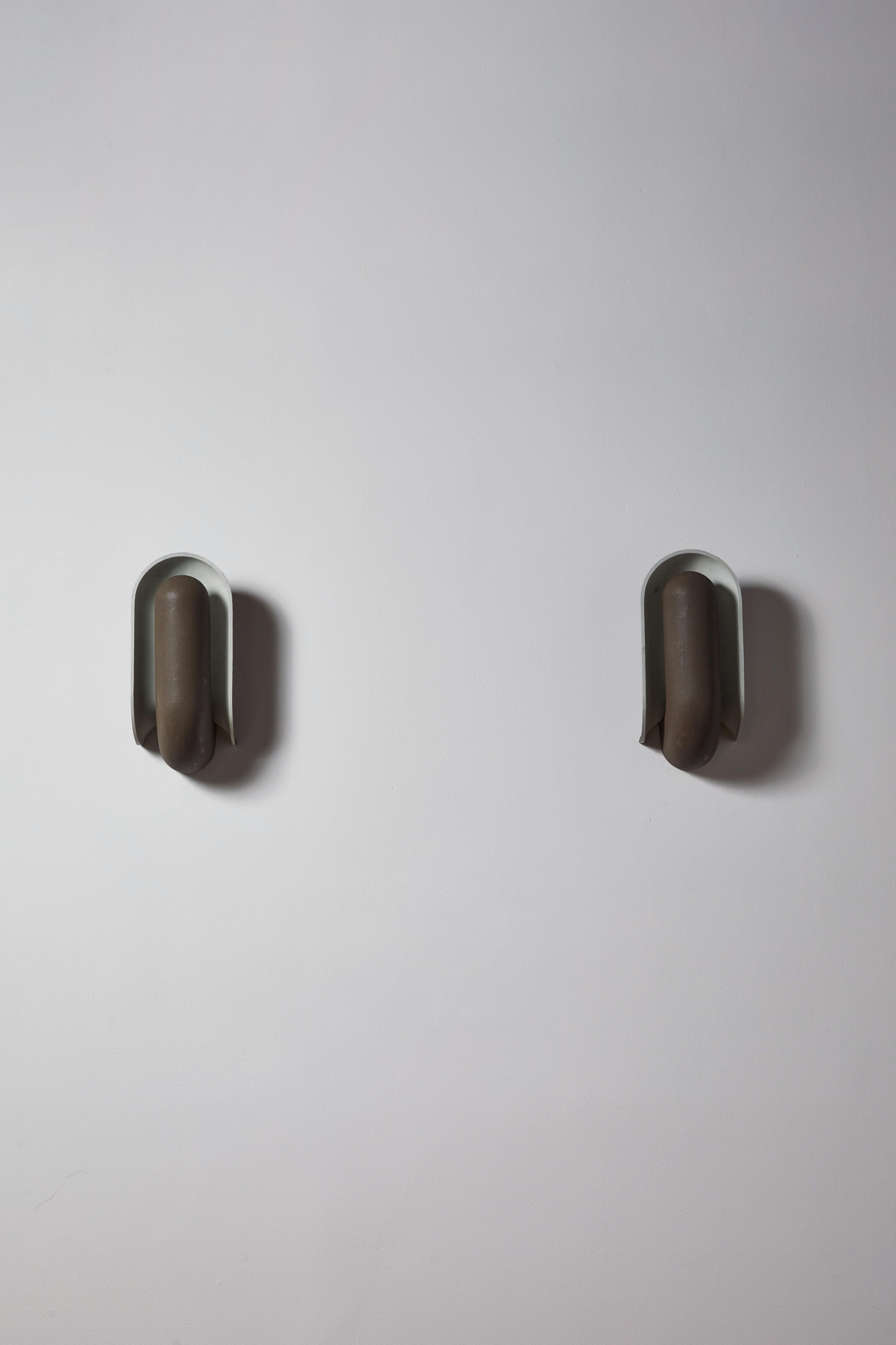 Aluminum Pair of Schelpdier Sconces by Piet Cohen for RAAK