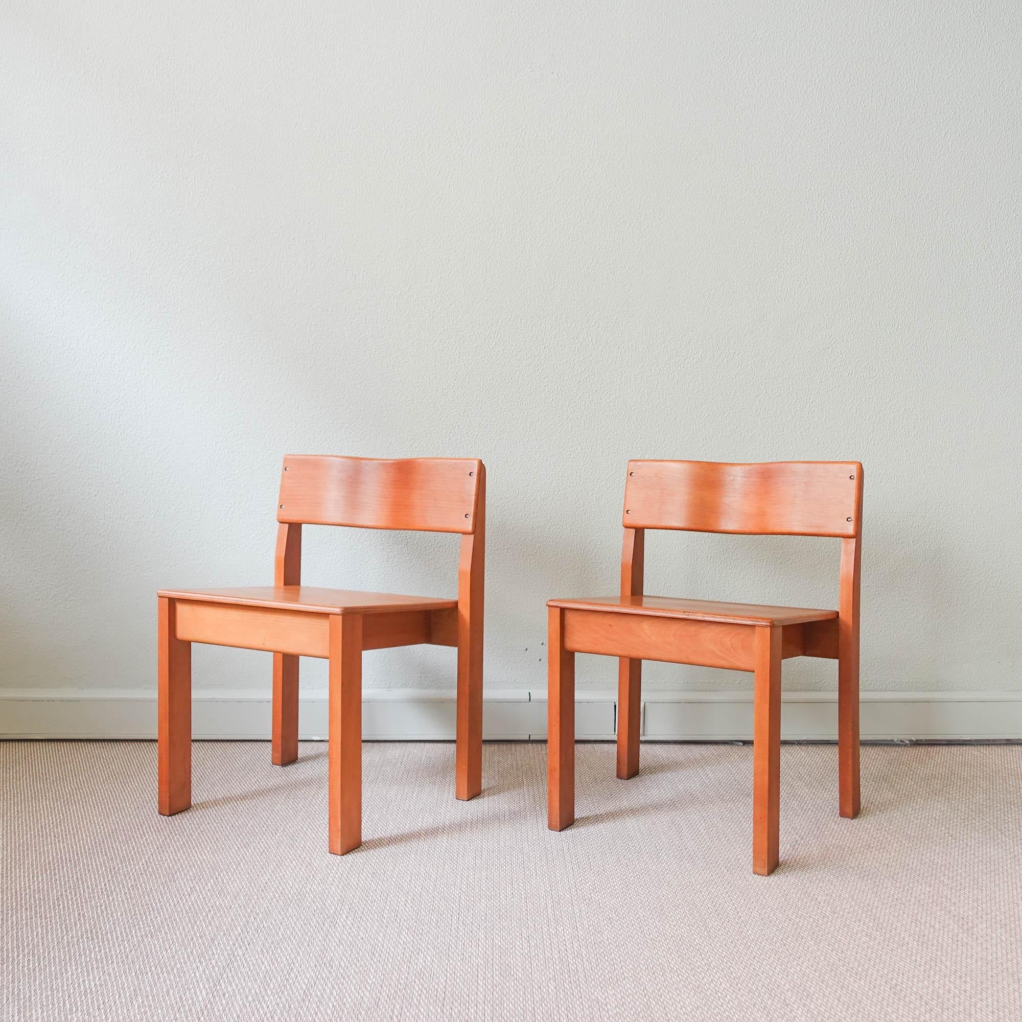 This pair of school chairs, model Sena, was designed by António Sena da Silva, in colaboration with Gastão Martins Machado and Leonor Álvares de Oliveira, and produced by Móveis Olaio, in Portugal between 1972 and 1988. After 1988 was produced by