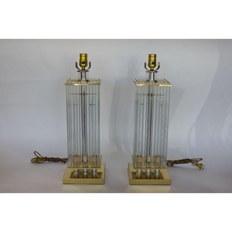 Pair of Sciolari brass and glass rod table lamps.