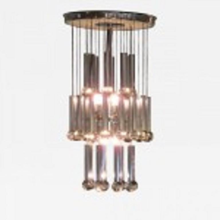 COPPIA di lampadari italiani moderni (anni '60) in cromo lucido. (SCOLARI)

Condit: Buono; Usura coerente con l'età e l'utilizzo
