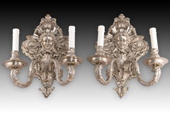 Pair of sconces. Bronze. Silver finish.