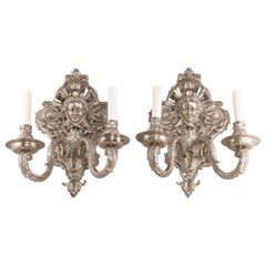 Pair of sconces. Bronze. Silver finish.