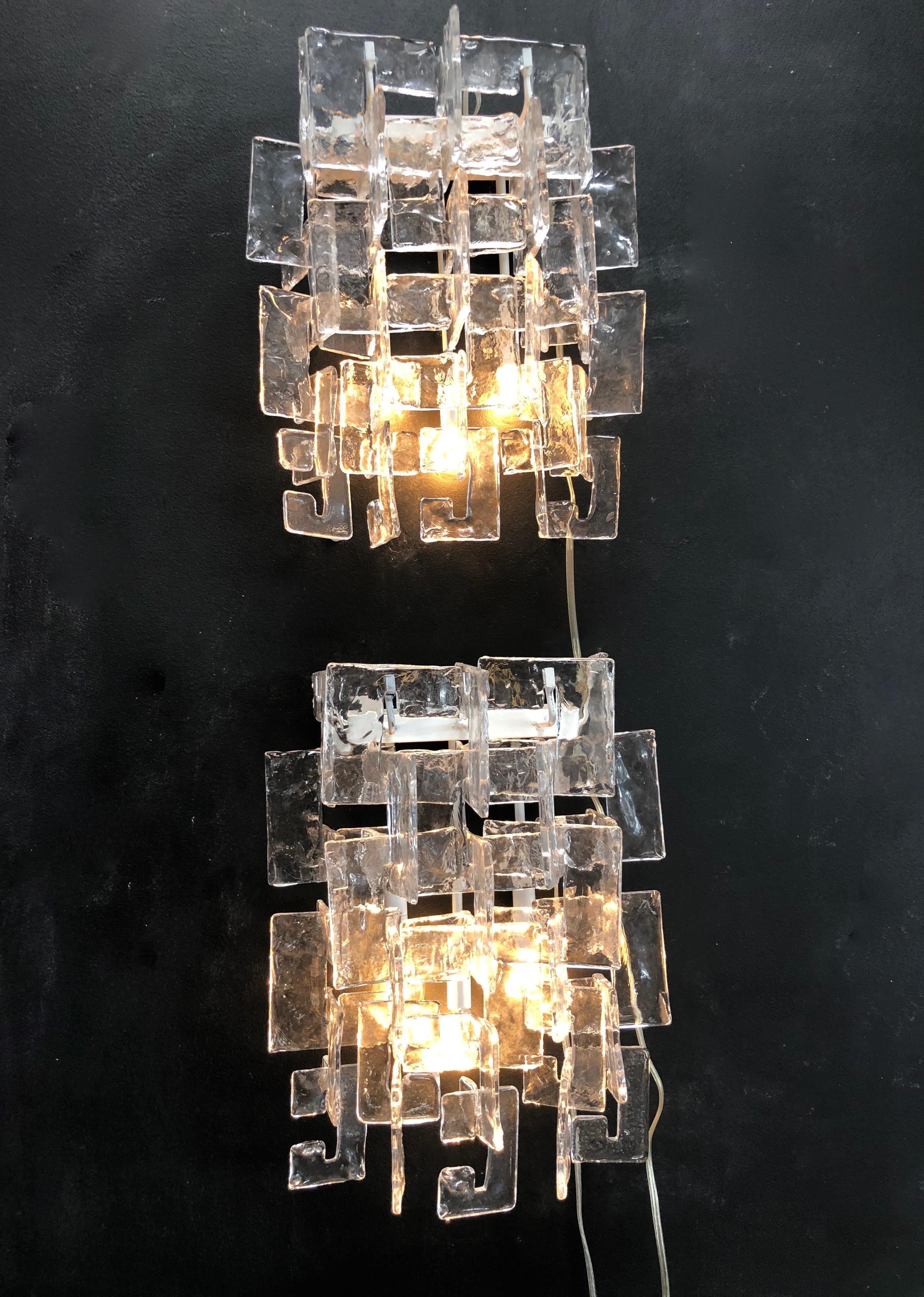 Pair of rare big C Cascade sconces by the designer Carlo Nason for the manufacture Mazzega.
The great Murano glass quality, 30 amber and 44 white ice glass.
Really important by the glass size and long for a pair of this style.