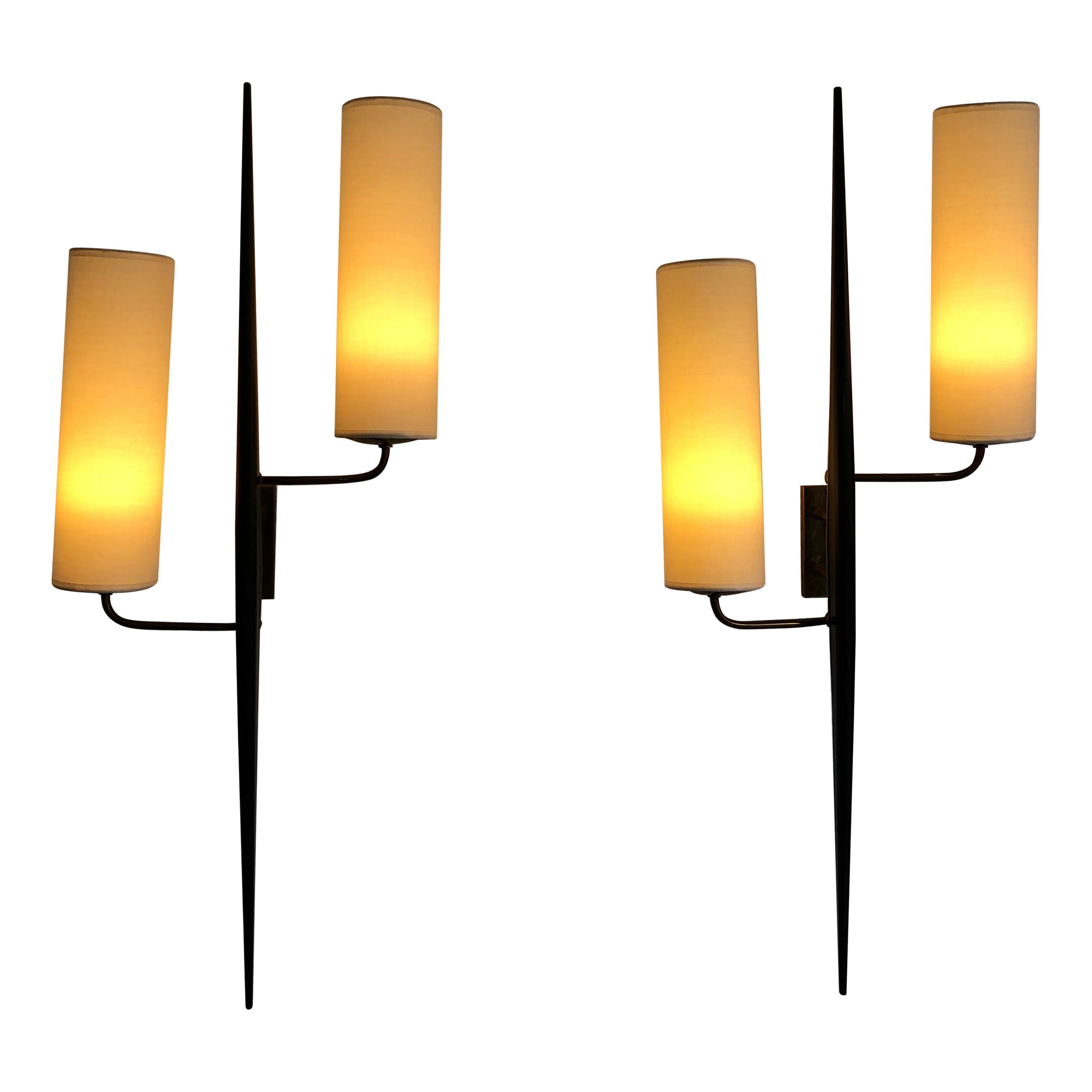 Pair of sconces by Maison Lunel
from 1950
in black lacquered wood and brass
lampshades.