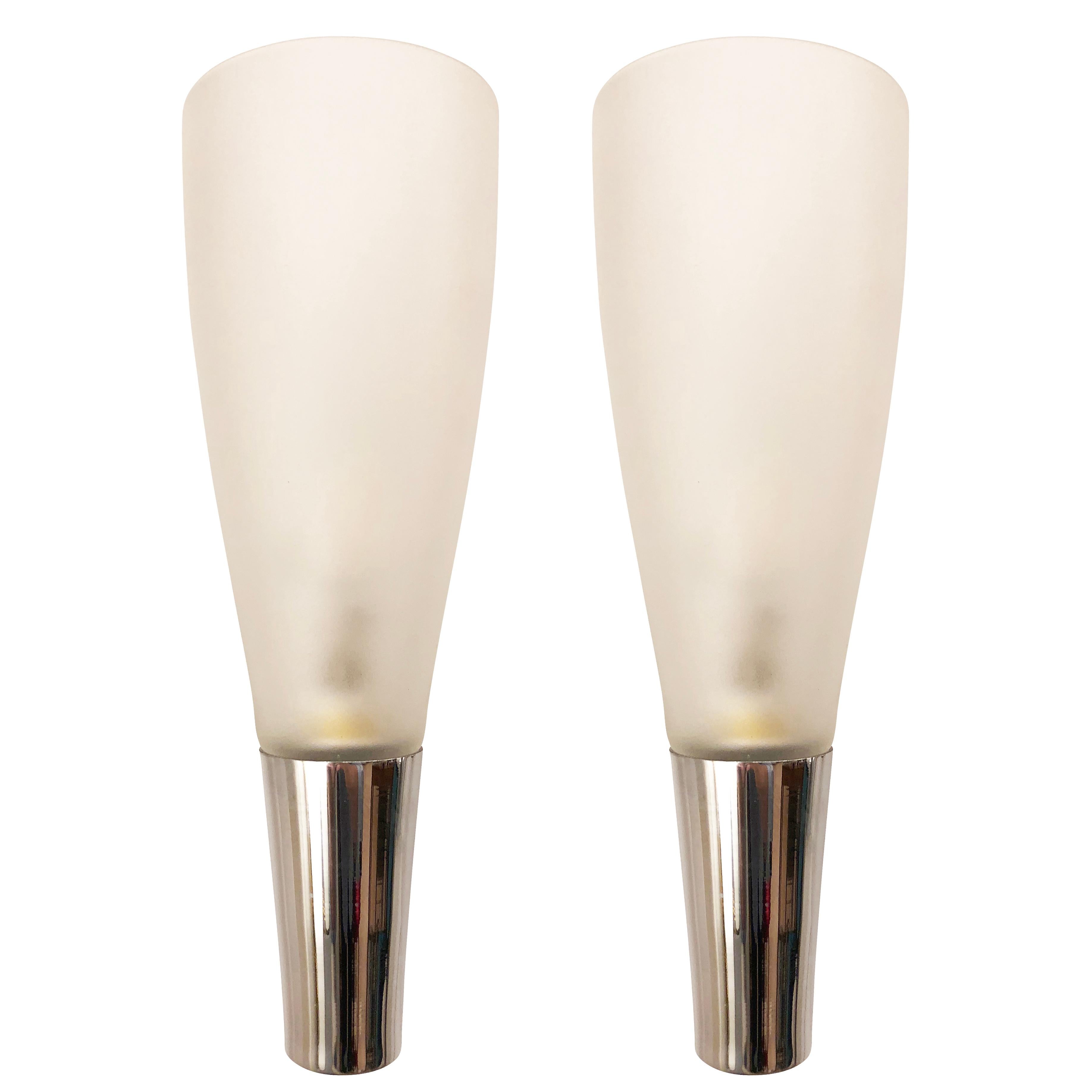 Classic pair of sconces designed by Pietro Chiesa for Fontana Arte in the late 1930s and attributed by some to Gio Ponti. They feature an iridescent frosted glass of superior quality on a nickel frame. Both Pietro Chiesa and Gio Ponti designed for