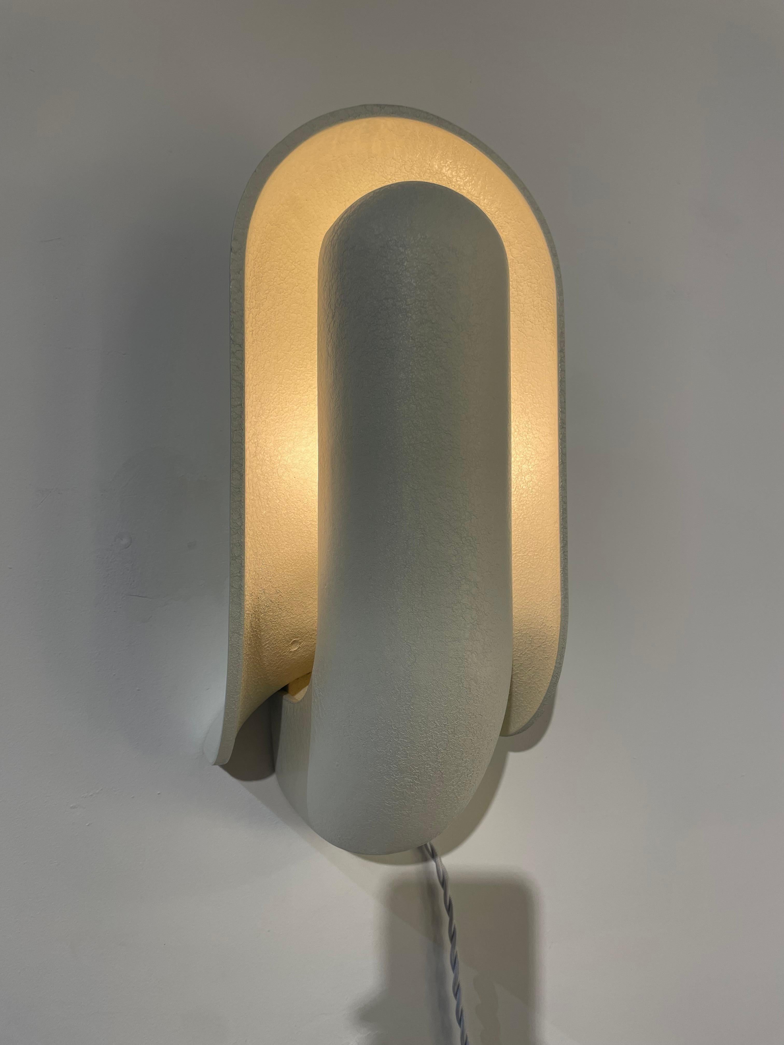 Par de Apliques By Raak Metal en venta