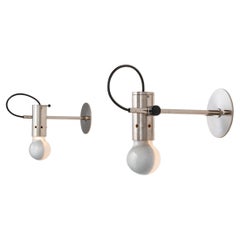 Pair of Sconces by: Tito Agnoli for Oluce