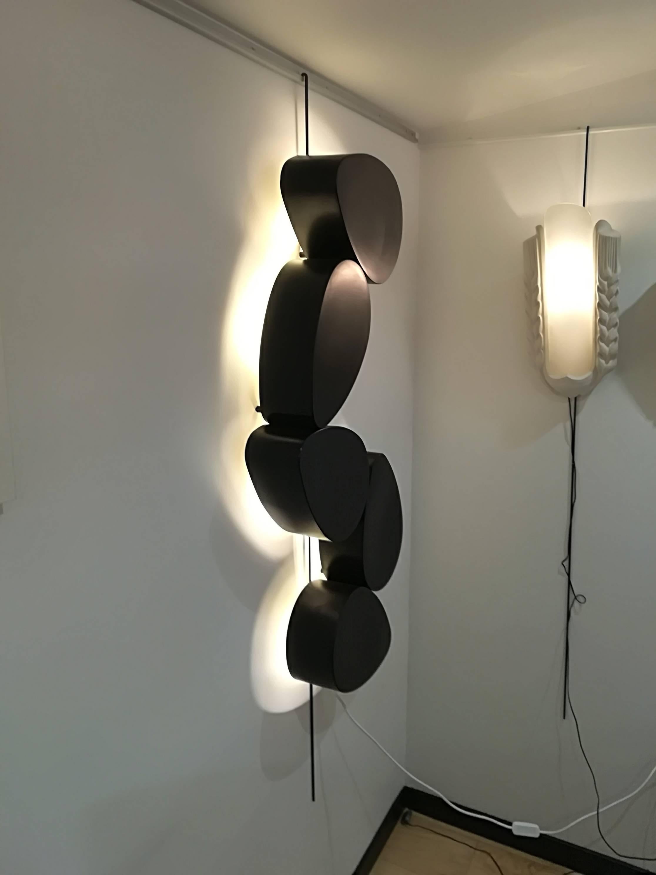 Pair of sconces five elements by Stephane Ducatteau, original design, in oxidized steel and darkened patina. 
Very small production, dated and signed.

