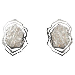 Pair of sconces in brushed metal and rock crystal. Contemporary.
