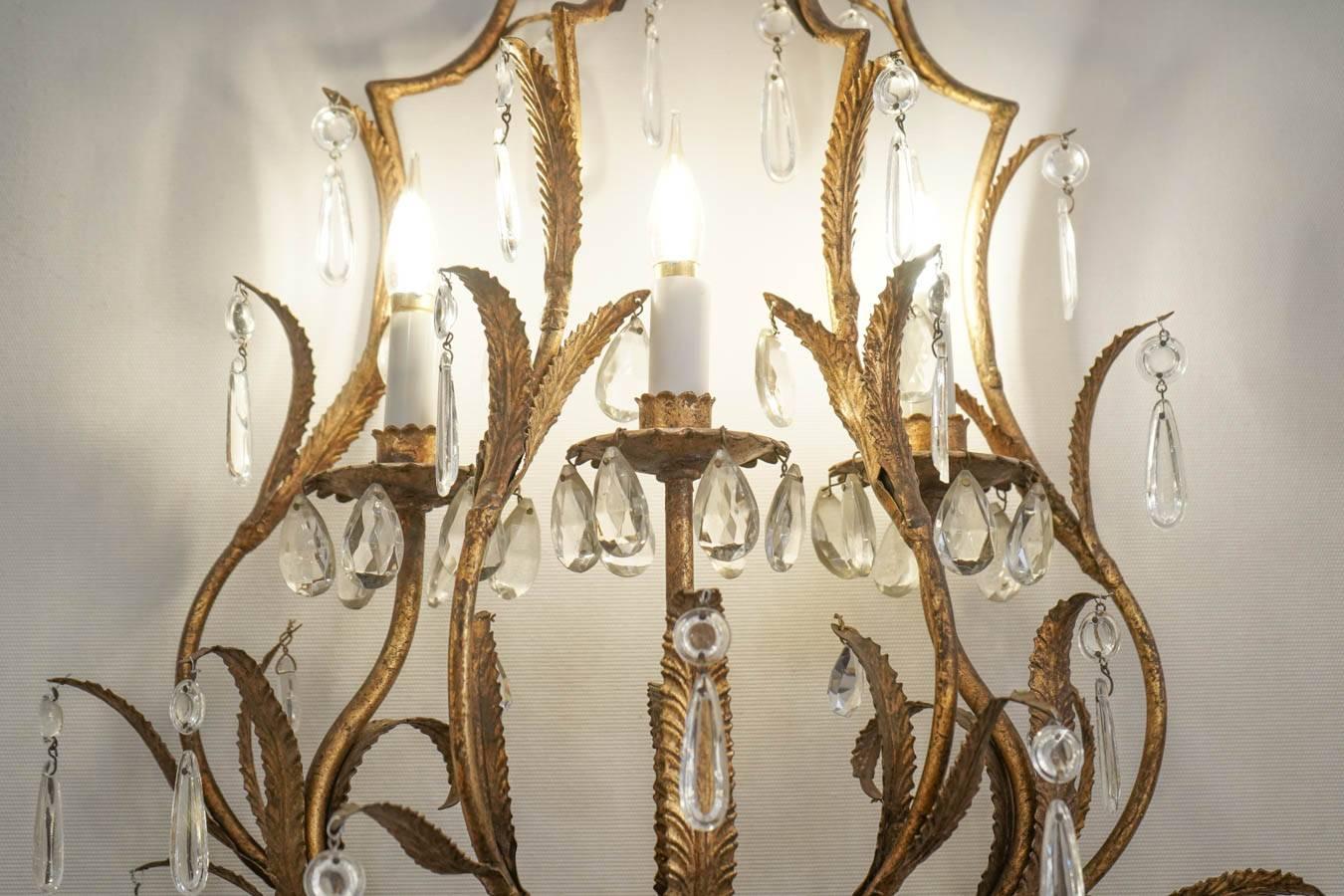 Pair of Sconces in Gold gilt metal with crystals, 1950-1960, Three lights In Good Condition In Saint-Ouen, FR