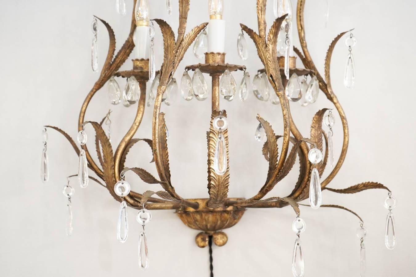 Iron Pair of Sconces in Gold gilt metal with crystals, 1950-1960, Three lights