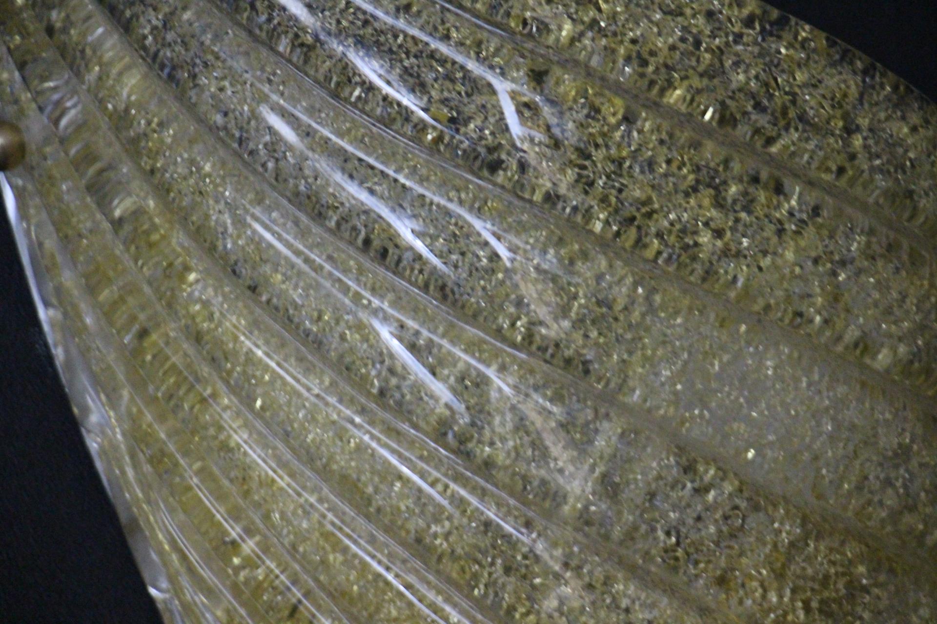 Contemporary Pair of Sconces in Golden Murano Glass Modeled As Wings For Sale