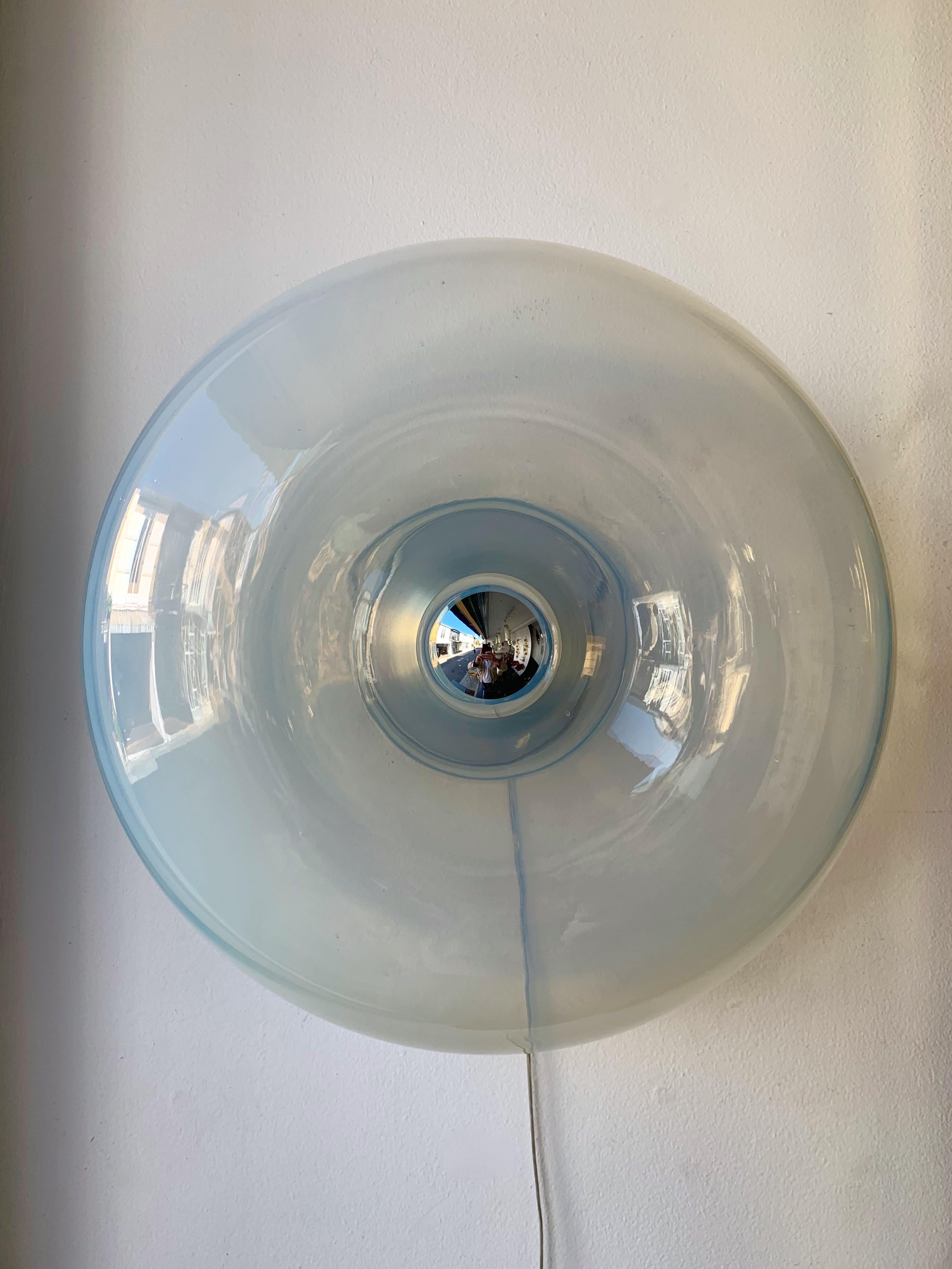 Rare Mid-Century Modern Space Age pair of sconces wall lights lamps or Flush mount ceiling or table lamps in blue opal blown Murano glass and silver metal by the designer Giusto Toso for the editor Leucos. Documentation available. Famous design like