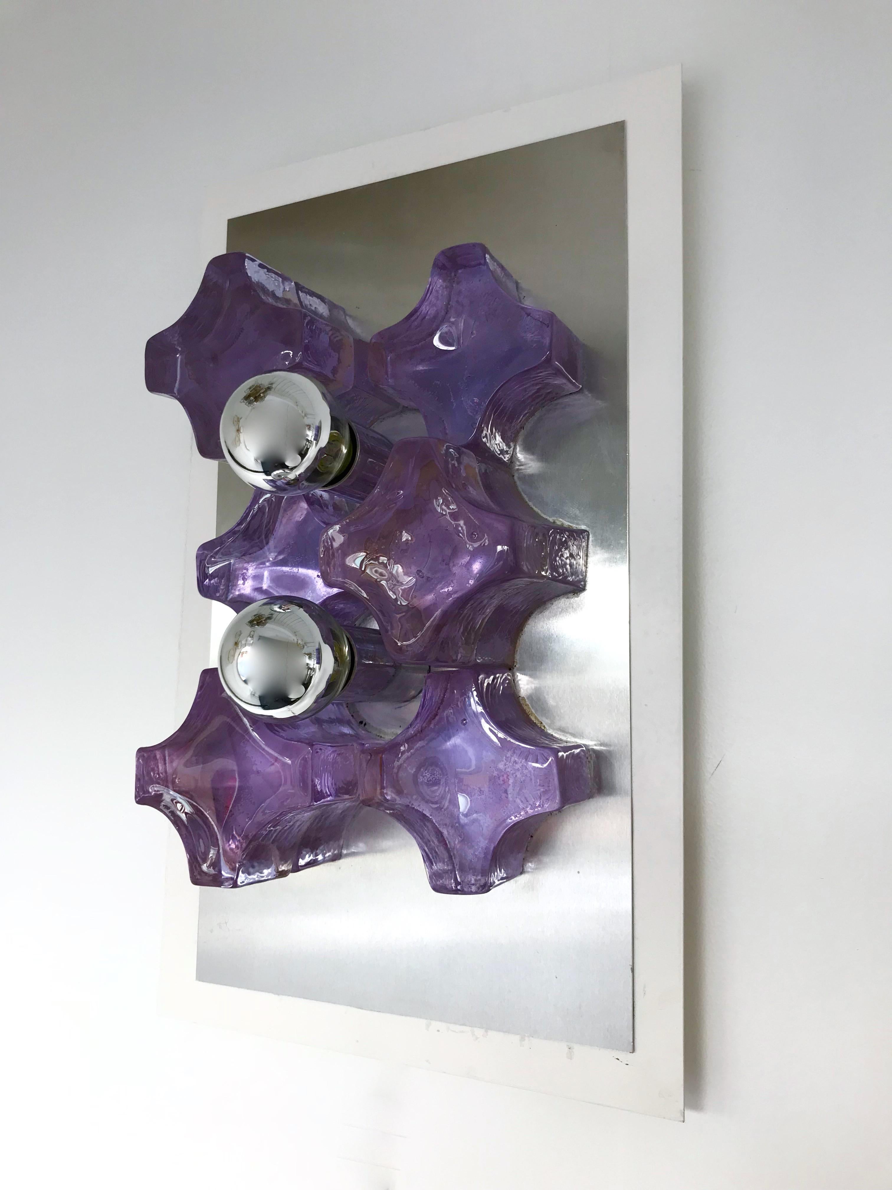 Rare model of purple pink pressed glass sconces, stainless steel and white lacquered by the manufacture Biancardi & Jordan Arte in Verona. The sconces can be use horizontally. Famous manufacture like Poliarte, Mazzega Murano, Venini, Vistosi, La