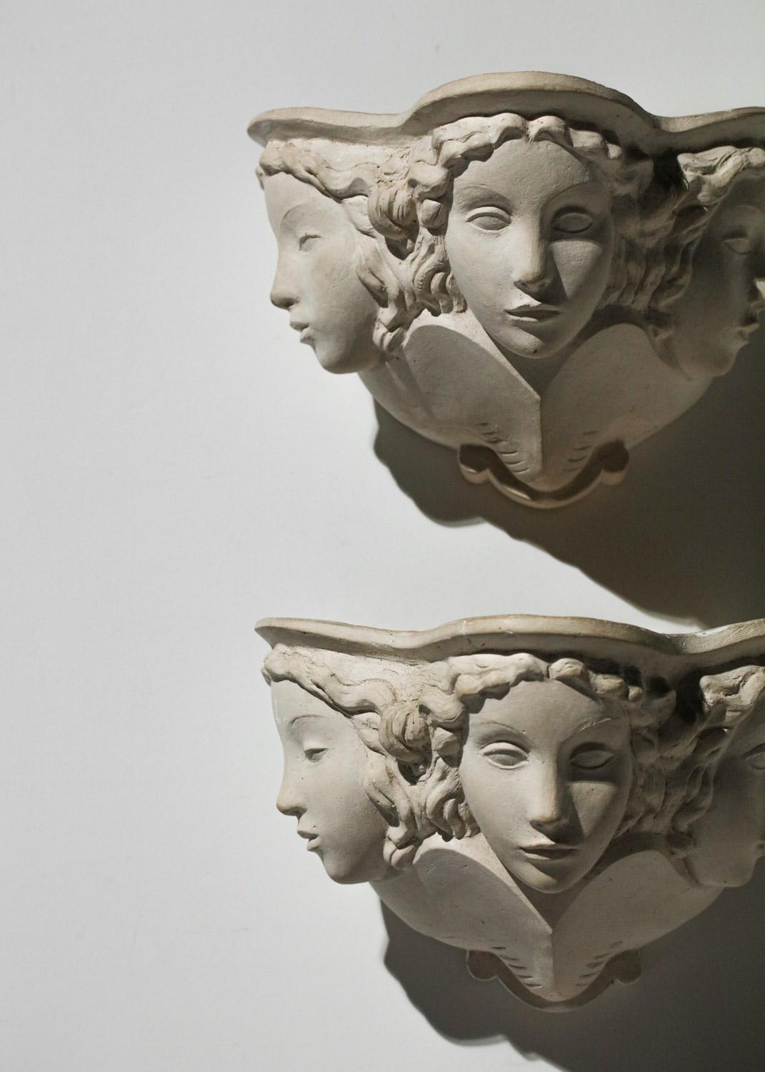 Rare pair of Art Deco sconces by the Russian artist Vadim Androusov from the 30's, who worked in close collaboration with the French decorator André Arbus. Structure of the sconces in white plaster representing a mermaid with three heads. Sober and
