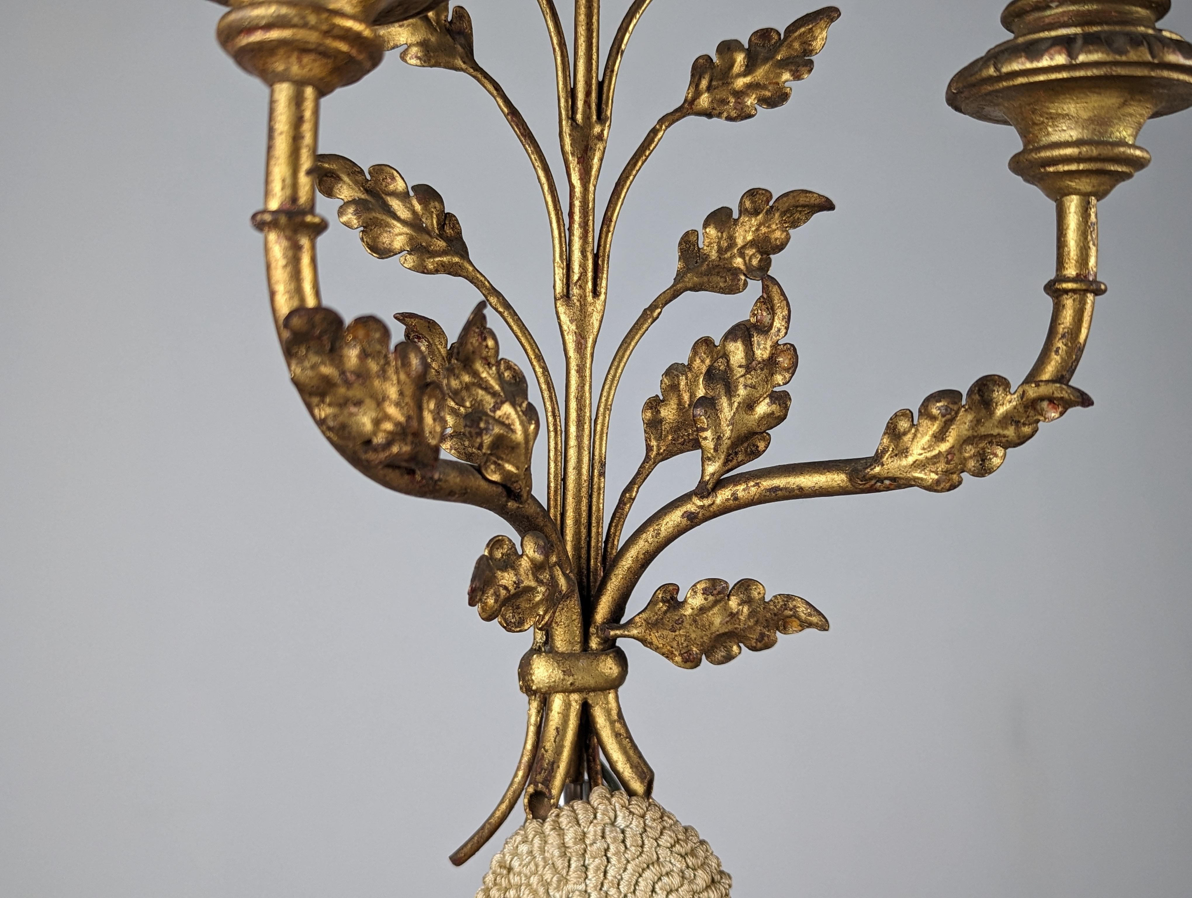 Metal Pair of sconces with mirror between birds and oak leaves