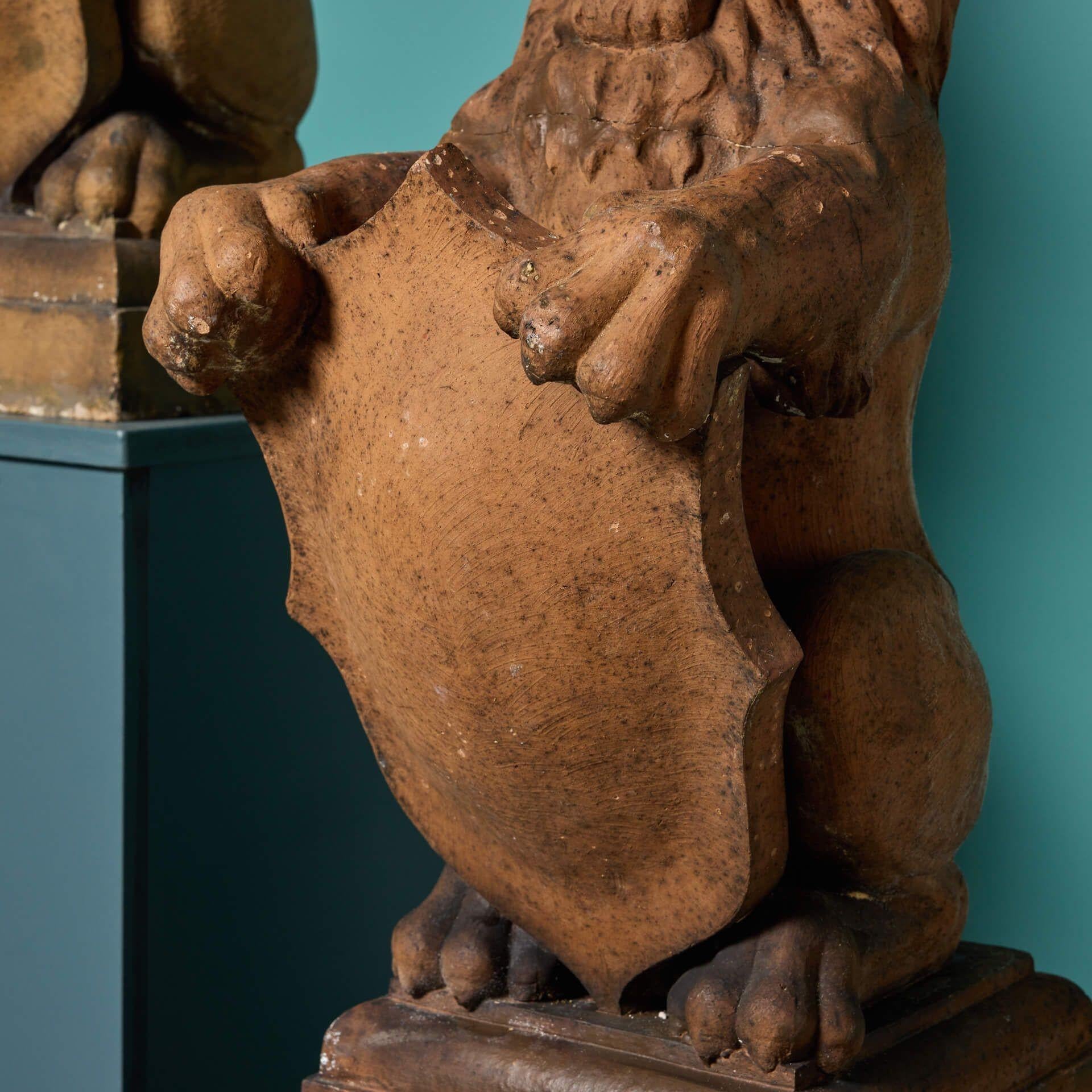 Clay Pair of Scottish Terracotta Shield-bearing Lion Finials For Sale