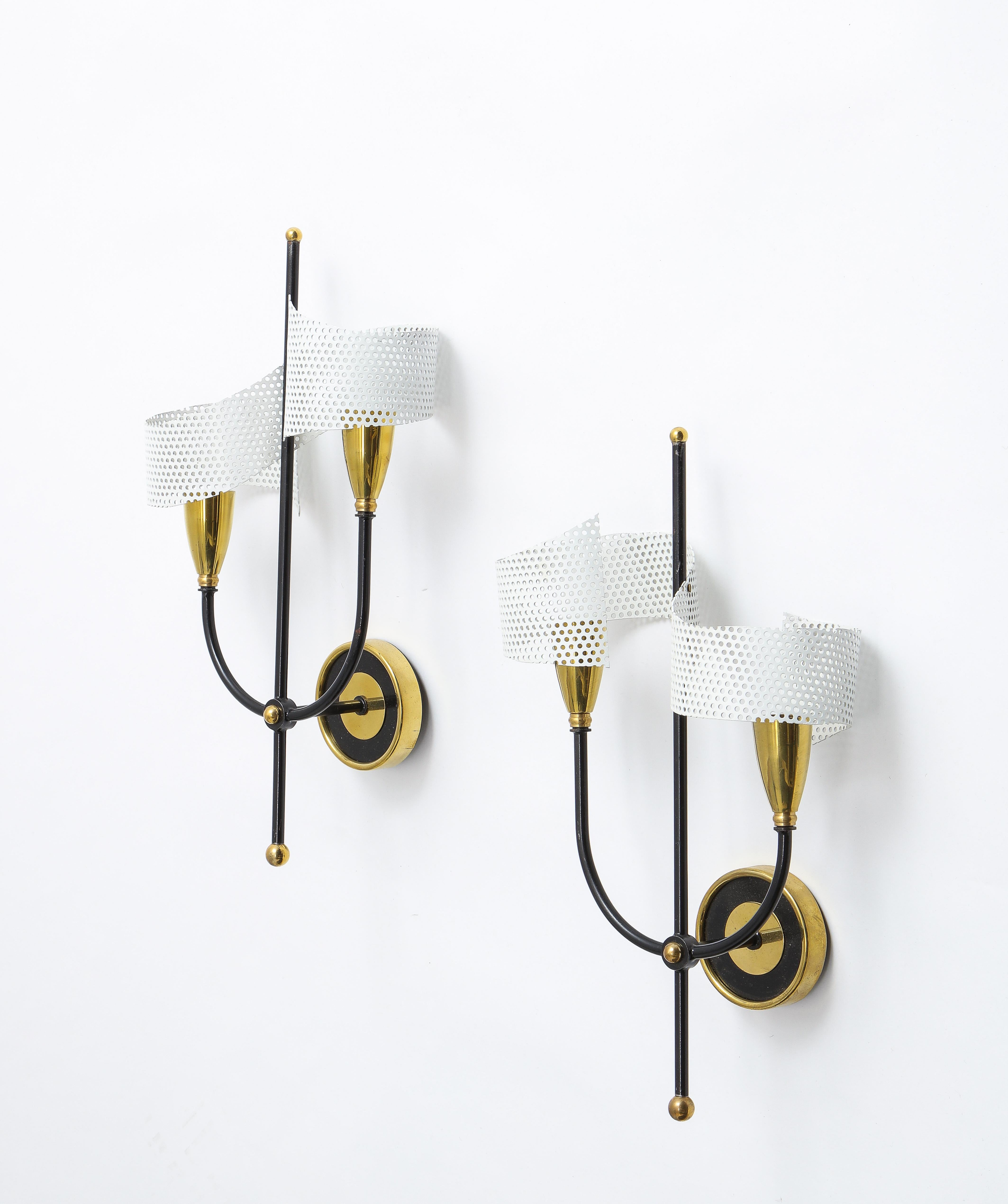 Pair of sconces in black enameled aluminum and brass with white enameled scroll rigitule shades in the style of Mategot, two lights, rewired.